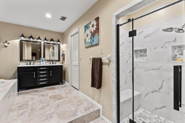 bathroom with vanity and an enclosed shower