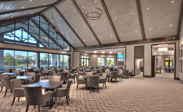 dining area featuring high vaulted ceiling, beam ceiling, and carpet