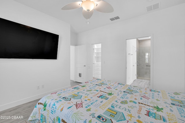 232 Ocean Hammock Loop, Daytona Beach, FL 32124 - bedroom with connected bathroom, ceiling fan, wood finished floors, and visible vents