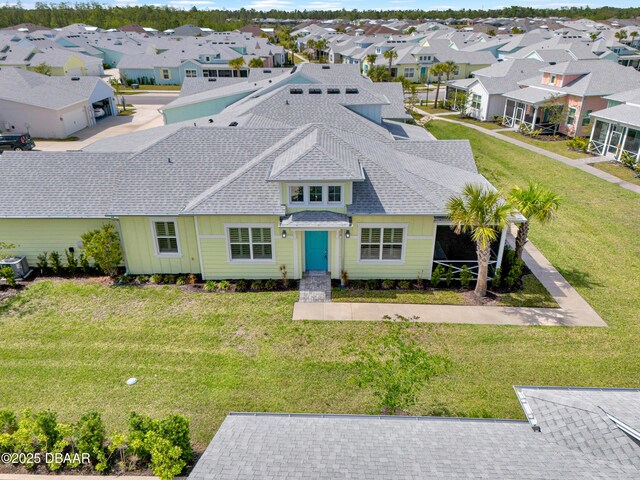 232 Ocean Hammock Loop, Daytona Beach, FL 32124 - exterior space with roof with shingles, a residential view, and a front yard