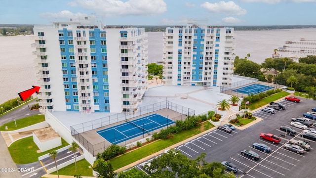 view of building exterior with a water view