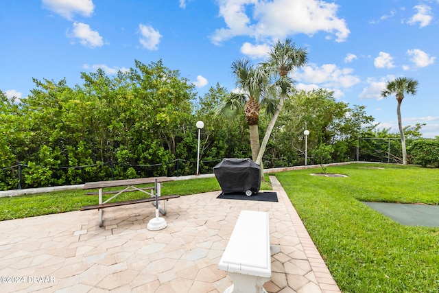 exterior space featuring a patio and a yard