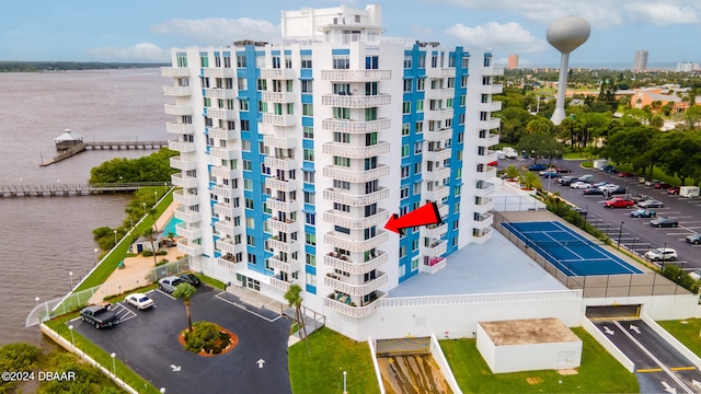 view of building exterior with a water view