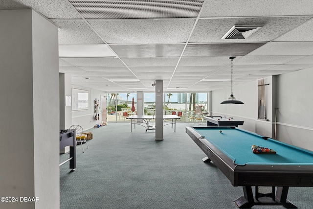 recreation room with a paneled ceiling, billiards, and carpet floors