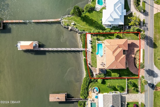 drone / aerial view with a water view