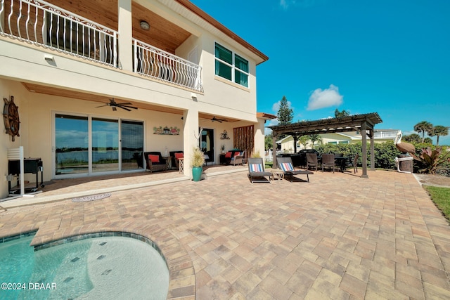 view of patio / terrace featuring ceiling fan, a balcony, and a pergola