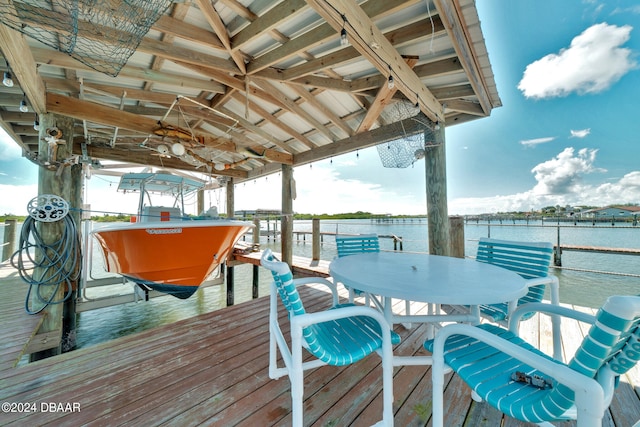 dock area with a water view