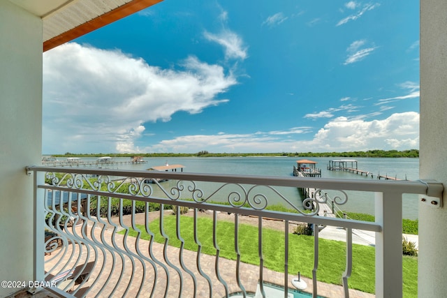 balcony featuring a water view