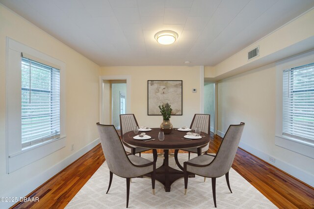 84 Lincoln Ave, Ormond Beach, FL 32174 - unfurnished room featuring lofted ceiling, hardwood / wood-style floors, and baseboards