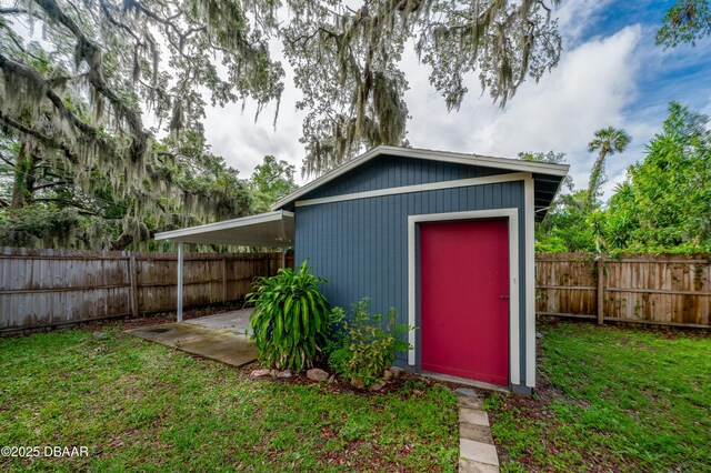 84 Lincoln Ave, Ormond Beach, FL 32174 - utility room with electric water heater and a sink
