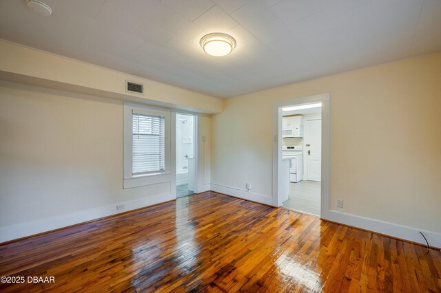 84 Lincoln Ave, Ormond Beach, FL 32174 - spare room with hardwood / wood-style flooring and baseboards