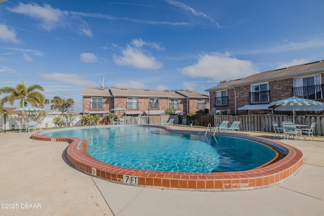 view of swimming pool featuring a patio