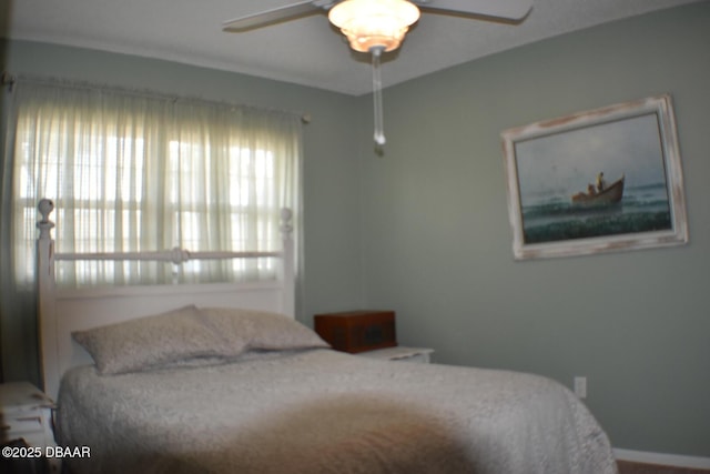 bedroom featuring a ceiling fan