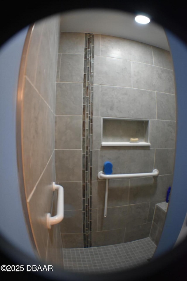 full bathroom featuring a shower stall