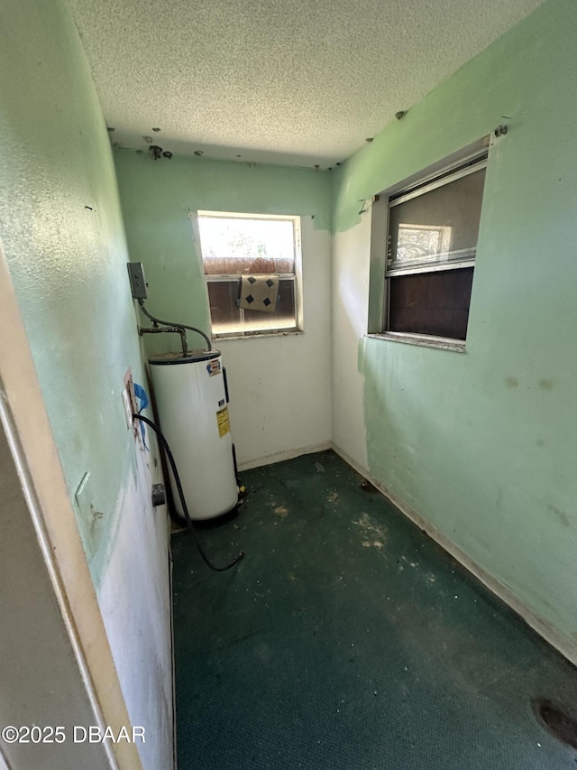 utility room featuring water heater