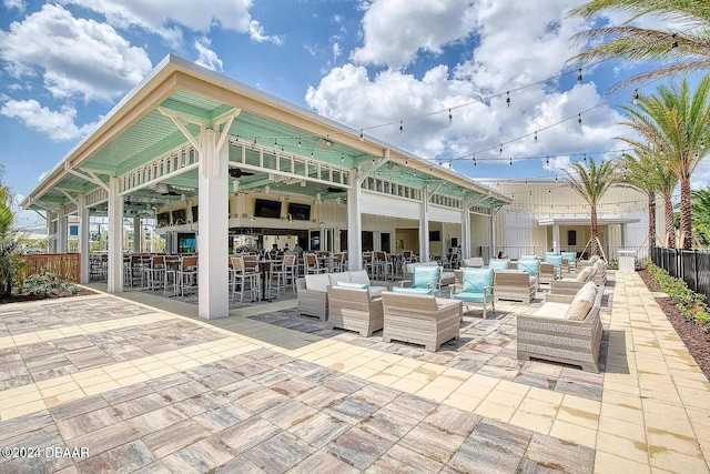 view of patio with an outdoor hangout area and exterior bar