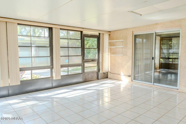 view of tiled spare room