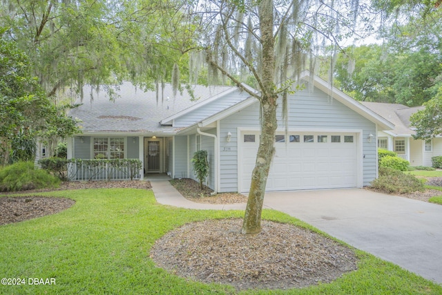 single story home with a front lawn and a garage