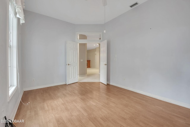 empty room featuring light hardwood / wood-style floors