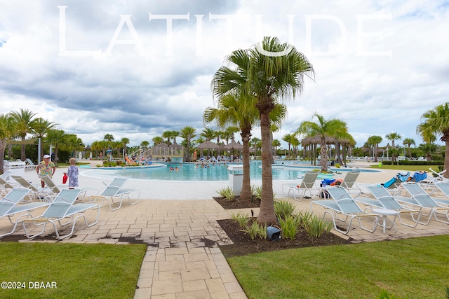 view of swimming pool with a patio