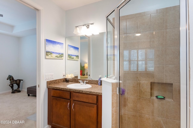 bathroom with vanity and walk in shower