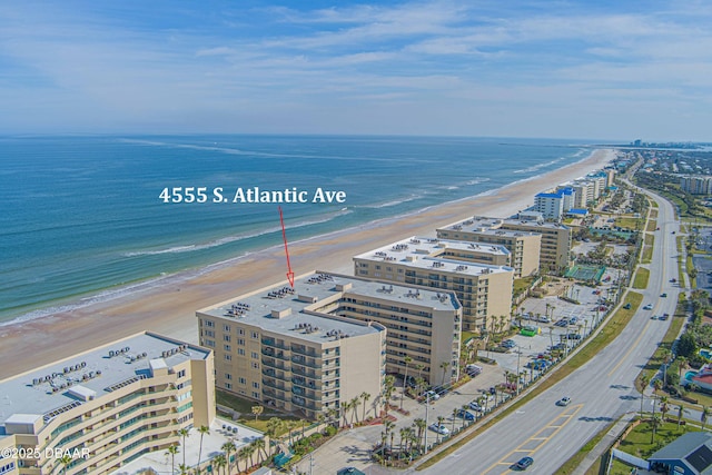 bird's eye view with a view of the beach and a water view