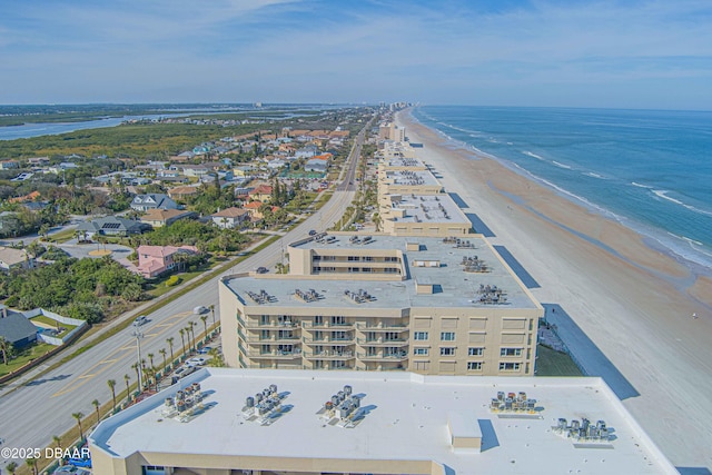 aerial view with a view of the beach and a water view