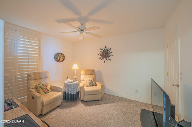 sitting room featuring carpet floors and ceiling fan