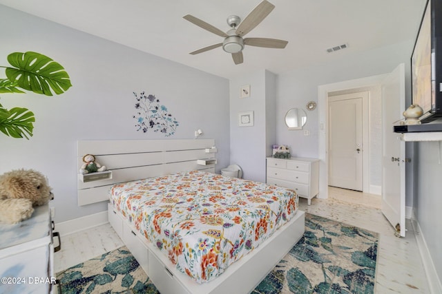 bedroom featuring ceiling fan and light wood-type flooring