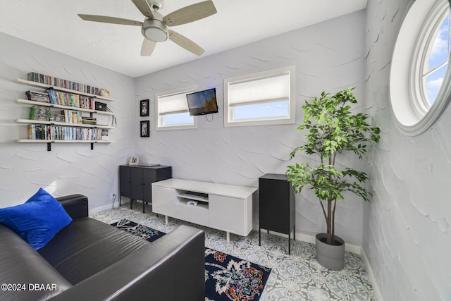 living room with ceiling fan