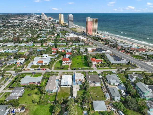 aerial view featuring a water view and a beach view