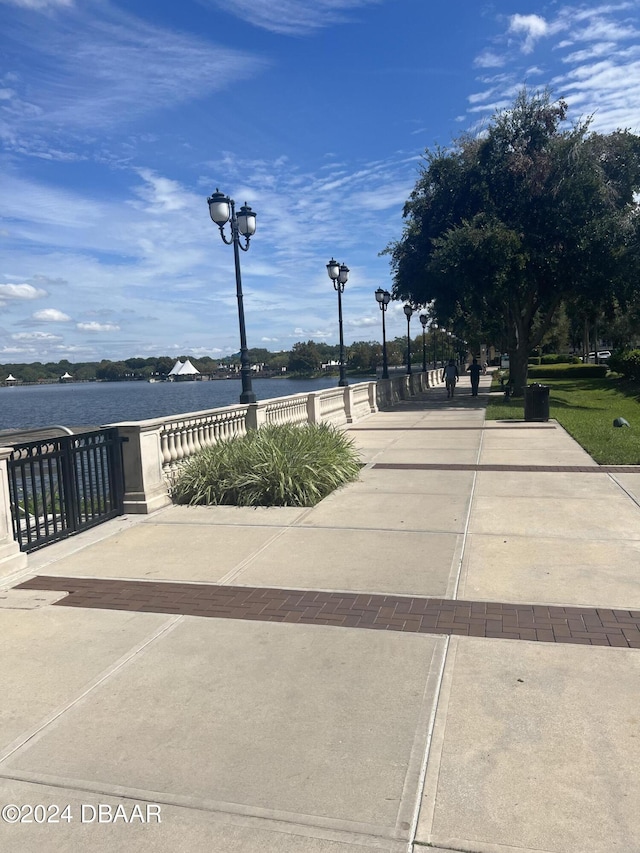 view of home's community with a water view