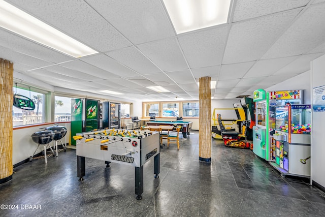 rec room featuring a paneled ceiling