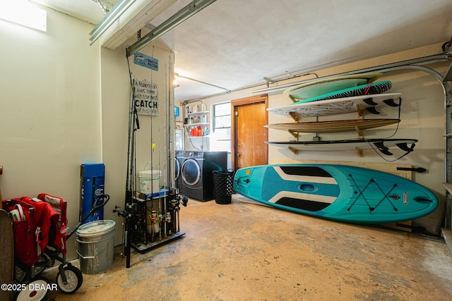 garage featuring washer and dryer