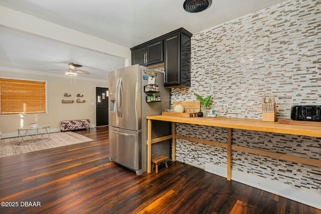 kitchen with decorative backsplash, stainless steel fridge with ice dispenser, dark hardwood / wood-style flooring, and wood counters