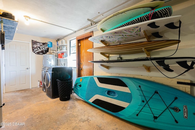 garage with stacked washer and dryer