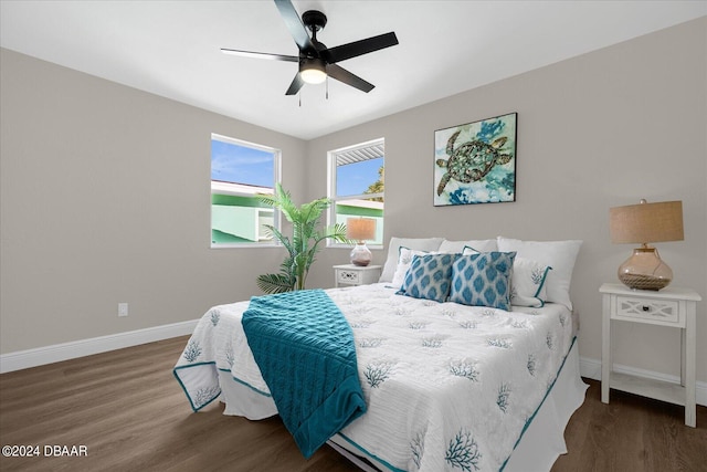 bedroom featuring dark wood-type flooring and ceiling fan