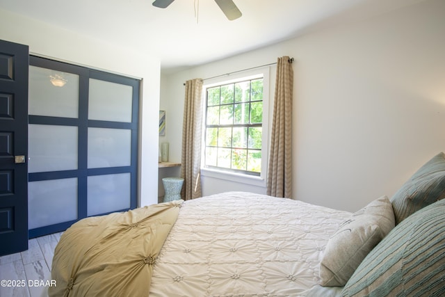 1076 Shockney Dr, Ormond Beach, FL 32174 - bedroom with wood finished floors and a ceiling fan
