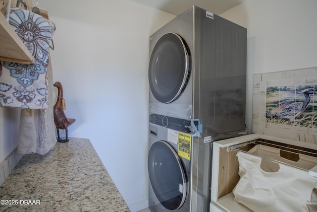 1076 Shockney Dr, Ormond Beach, FL 32174 - laundry room featuring stacked washer / dryer