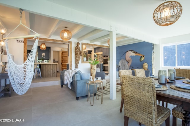 1076 Shockney Dr, Ormond Beach, FL 32174 - tiled dining area featuring beamed ceiling and a chandelier