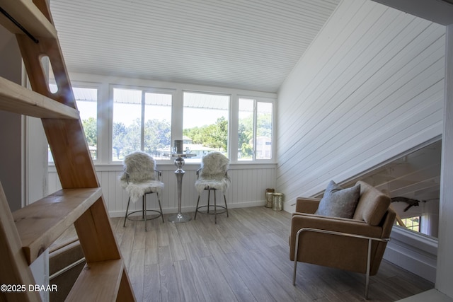 1076 Shockney Dr, Ormond Beach, FL 32174 - sitting room with wood finished floors and vaulted ceiling