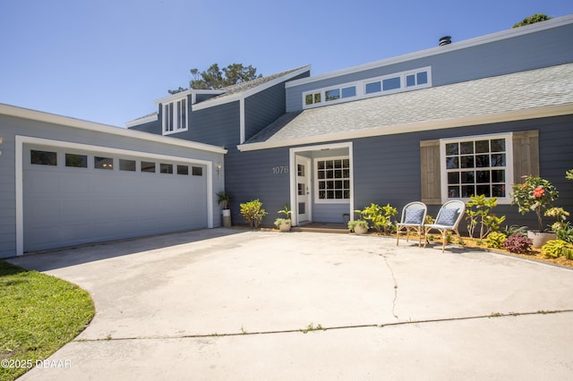 1076 Shockney Dr, Ormond Beach, FL 32174 - mid-century modern home featuring concrete driveway and an attached garage