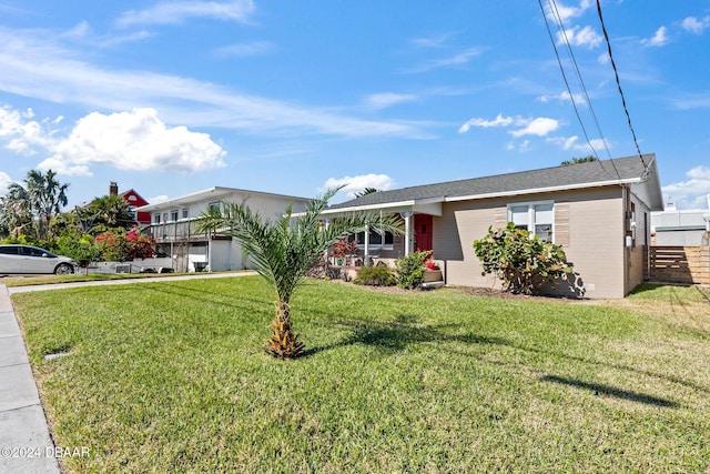 view of front of home with a front lawn