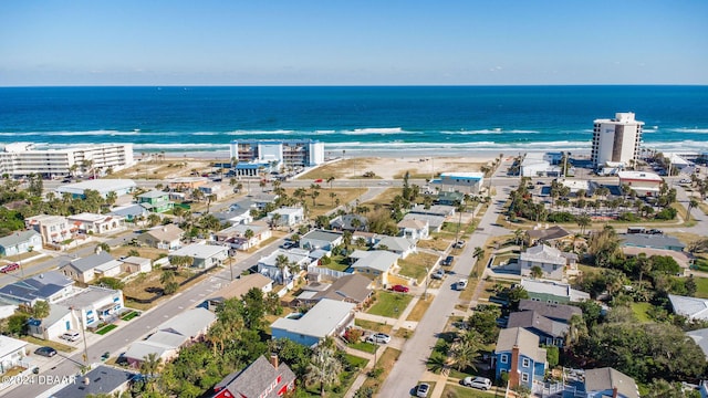 bird's eye view with a view of the beach and a water view