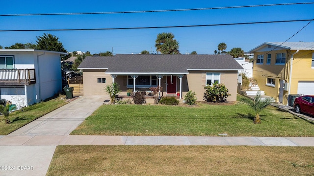 view of front of home with a porch and a front yard