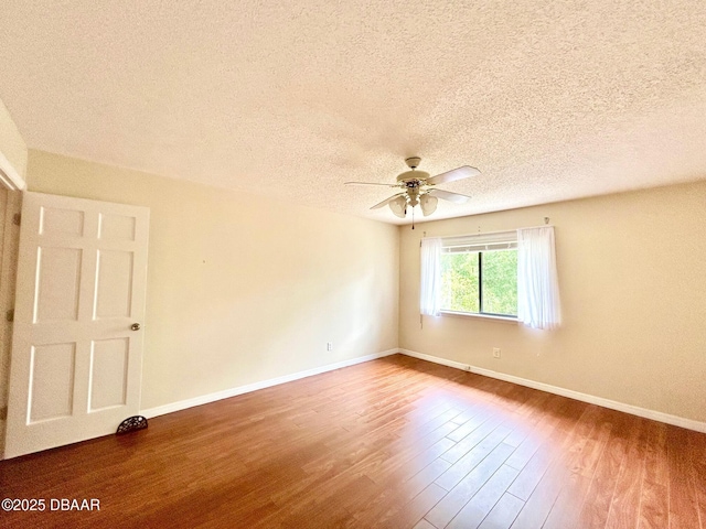 146 Deer Lake Cir, Ormond Beach, FL 32174 - spare room featuring a ceiling fan, wood finished floors, and a textured ceiling