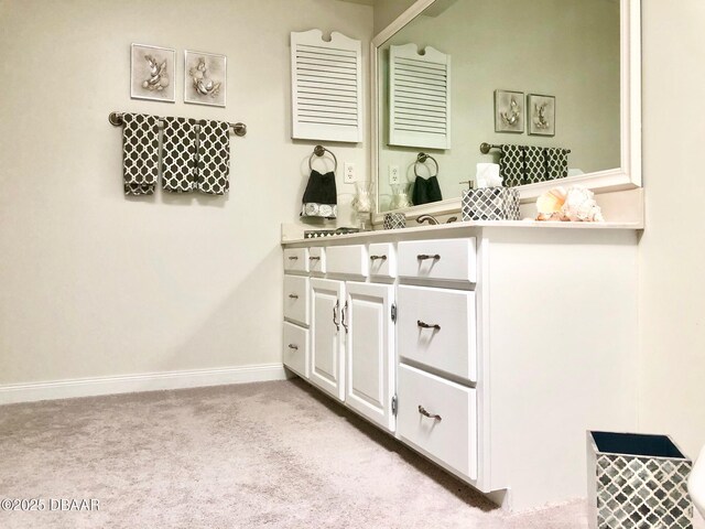 146 Deer Lake Cir, Ormond Beach, FL 32174 - bathroom with vanity and baseboards