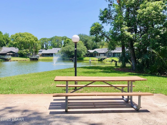 146 Deer Lake Cir, Ormond Beach, FL 32174 - view of home's community with a water view, a lawn, and a residential view