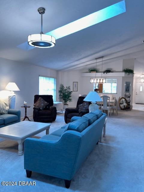 living room featuring lofted ceiling