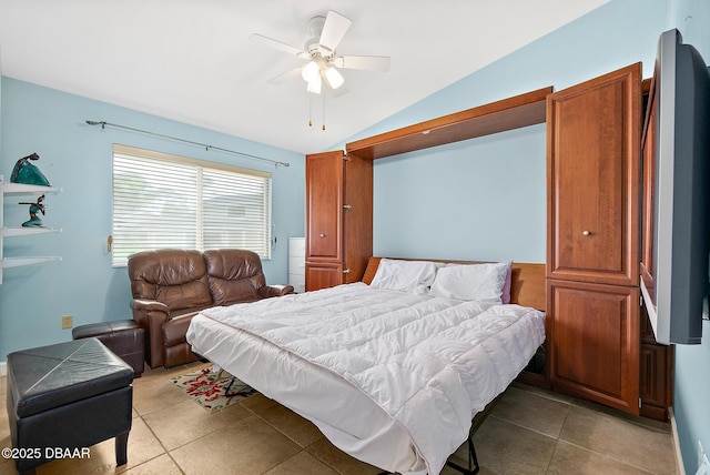 tiled bedroom featuring lofted ceiling and ceiling fan